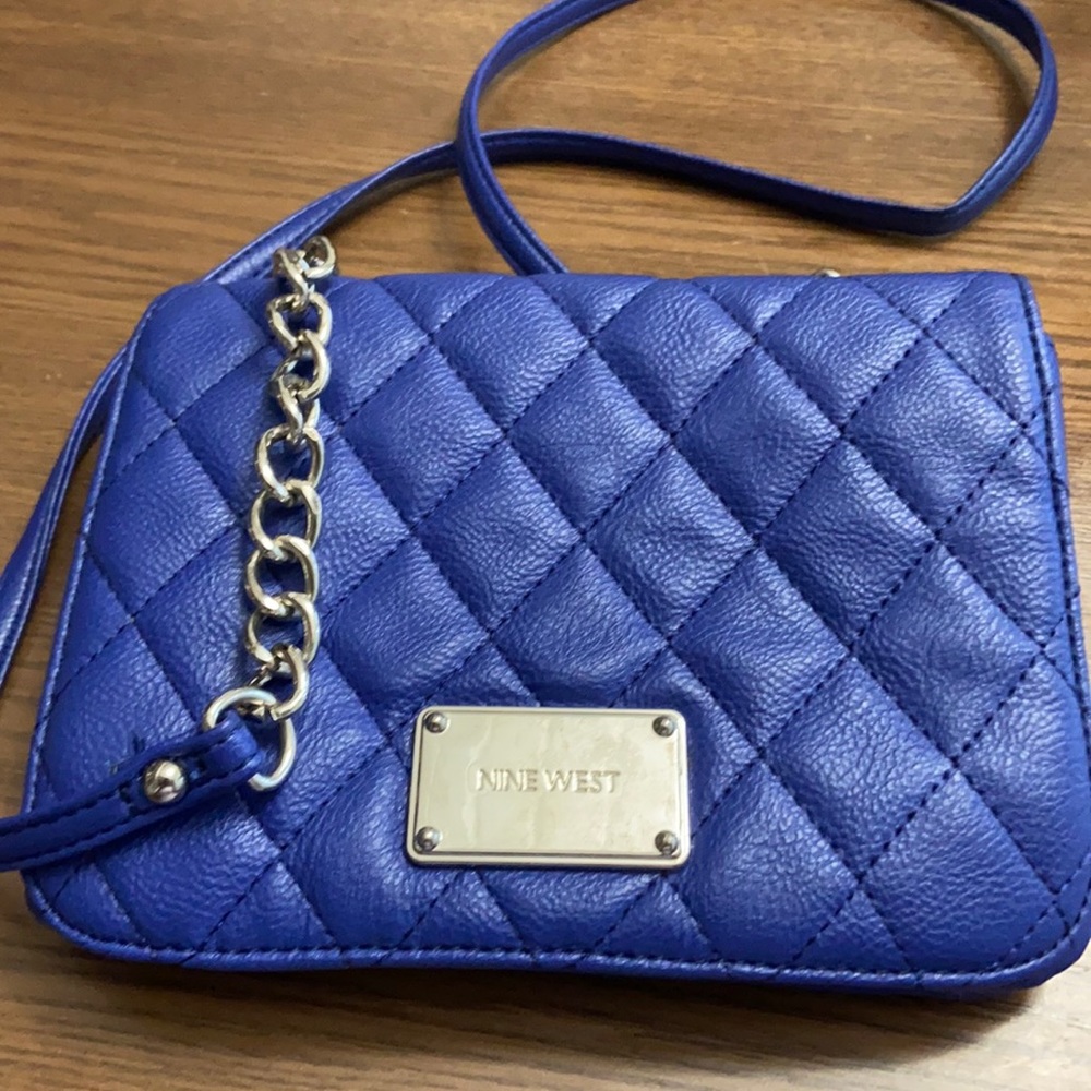 Worn only once. A vibrant Blue Nine West crossbody.